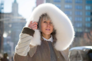 Linda Tol wearing white fur