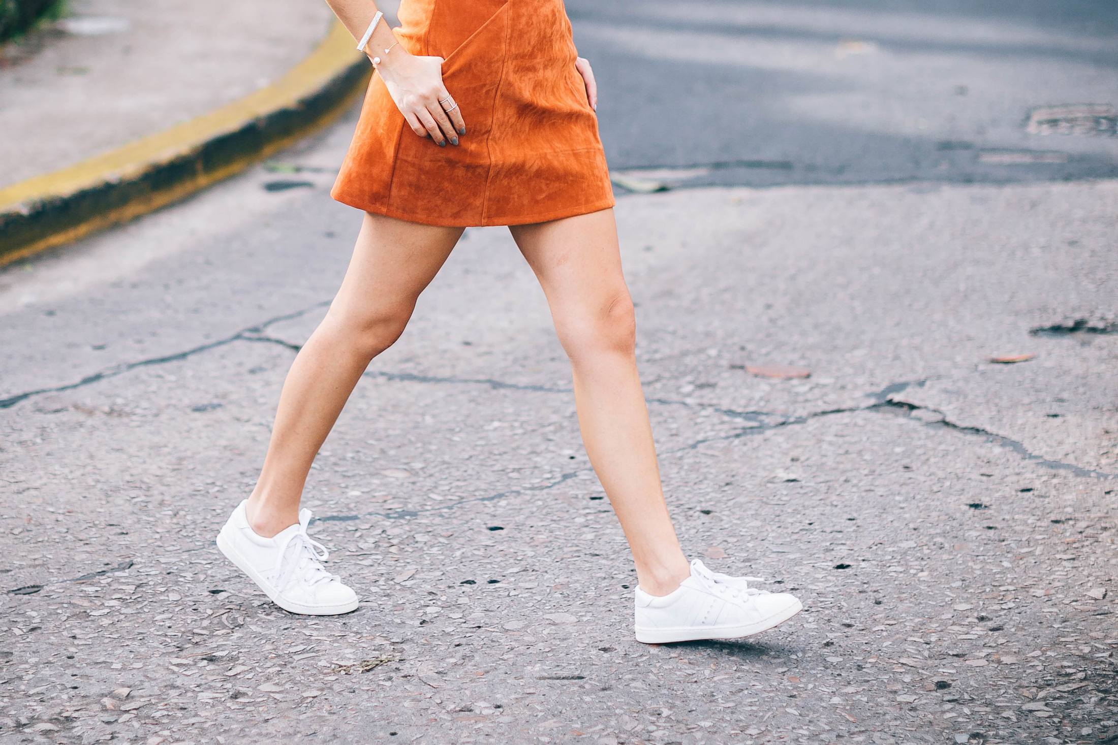 White Adidas style Zara leather sneakers and orange suede A Line Skirt by Minkpink