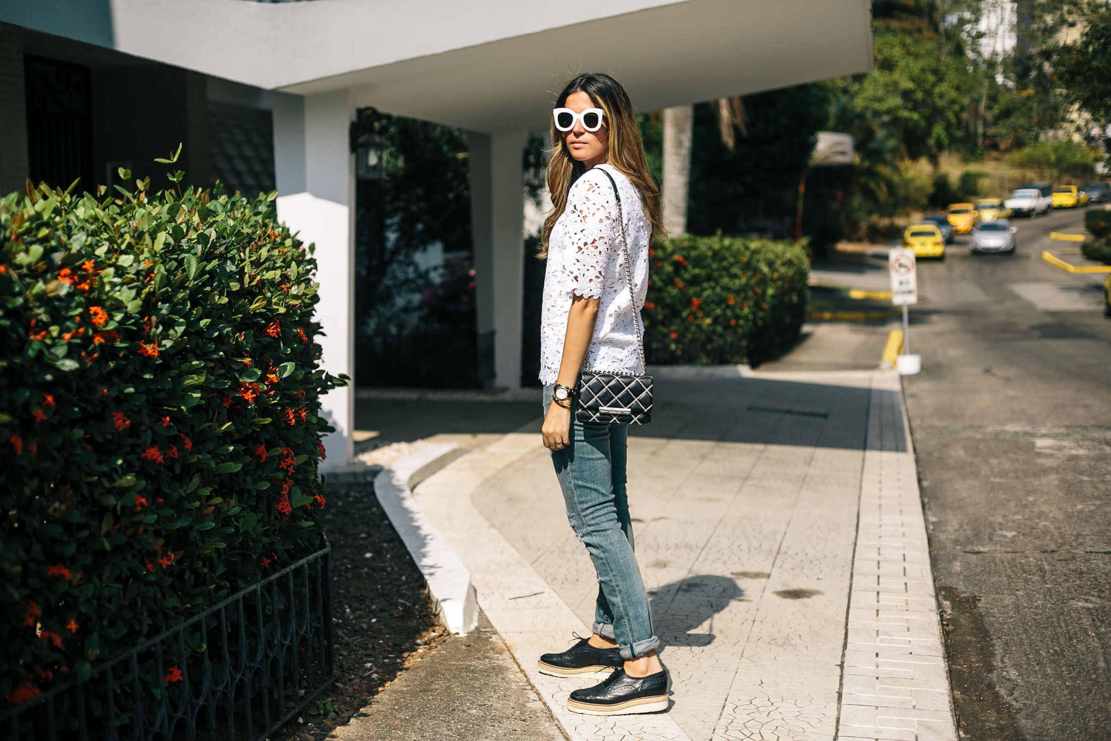 Mixing graphic details with girly lace, denim and menswear shoes