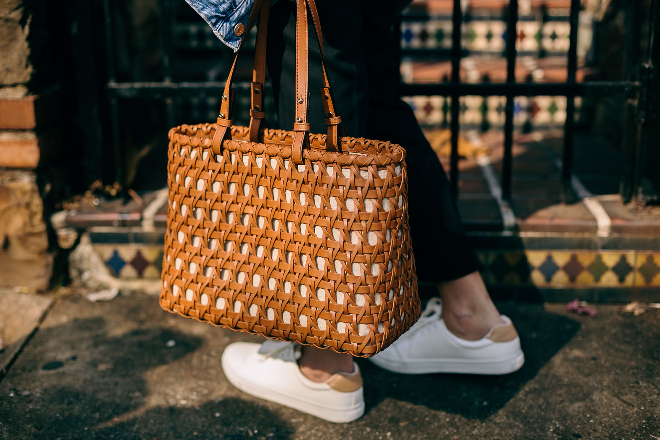 Kate Spade Tan leather bag and H&M white sneakers