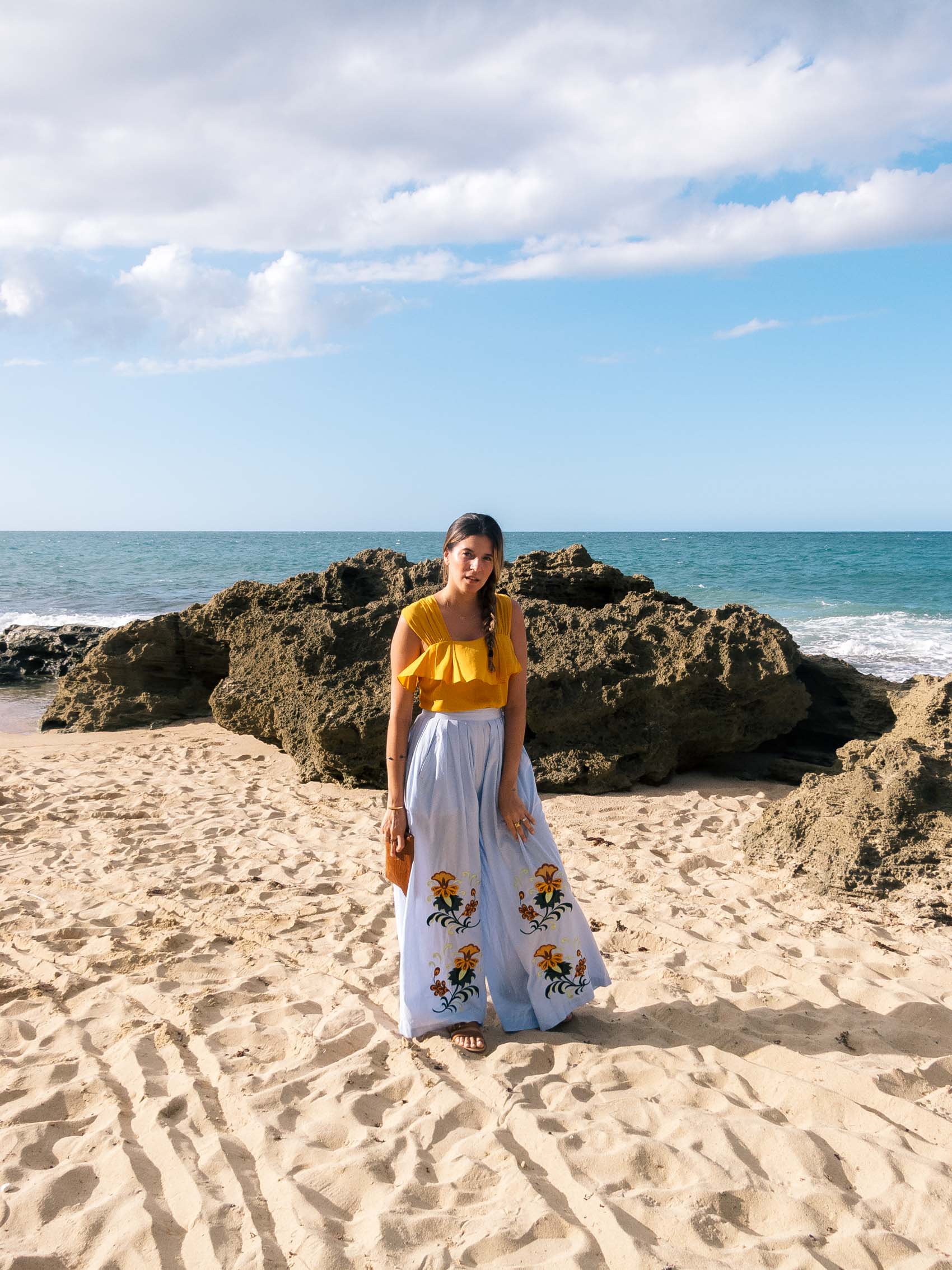 Maristella Gonzalez wearing Nightwalker flower embroidered chambray palazzo pants and a Zara top in Puerto Rico, resort wear ideas, vacation style, travel outfit ideas