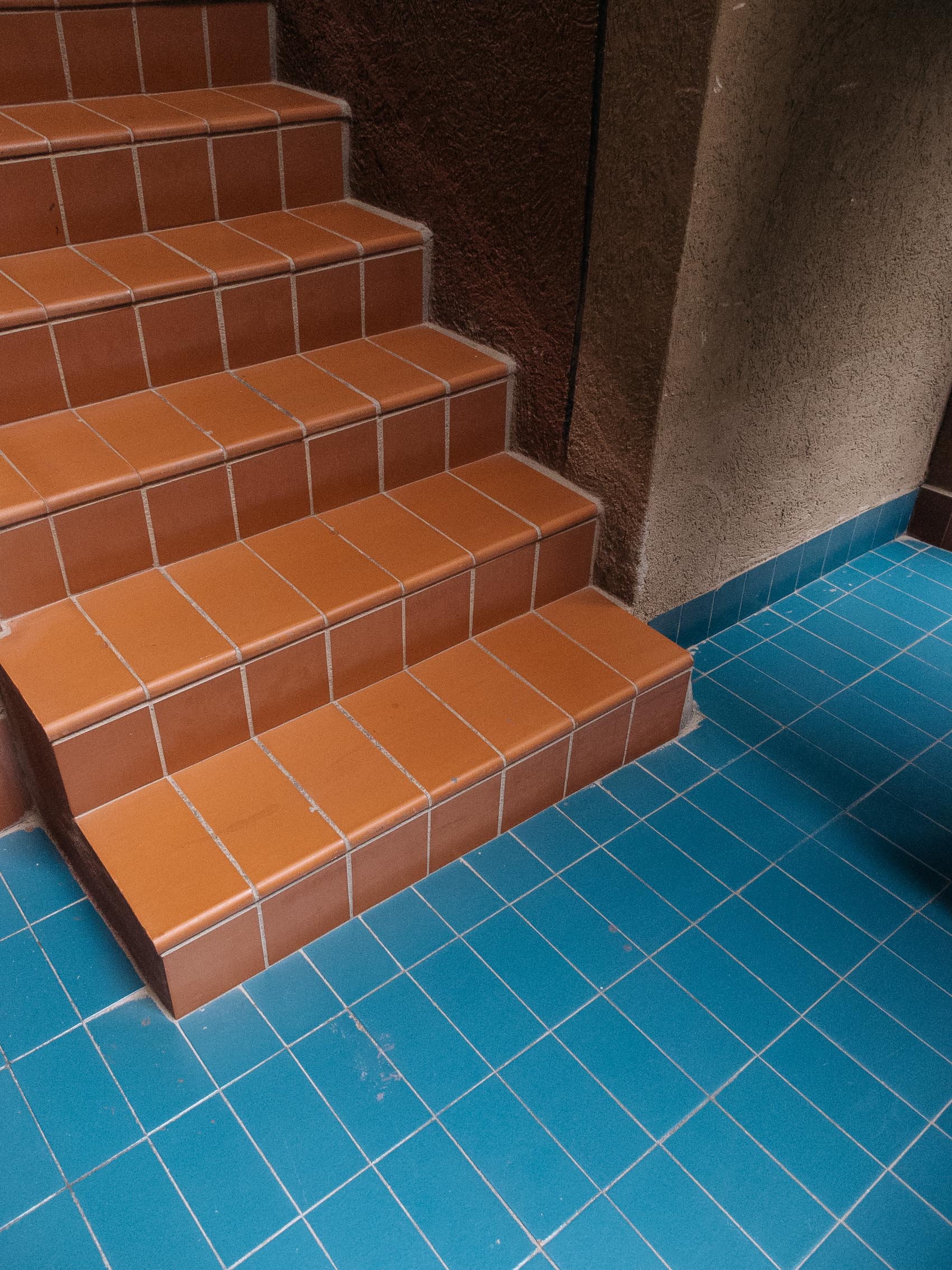 Walden 7 staircase with orange and blue tiles