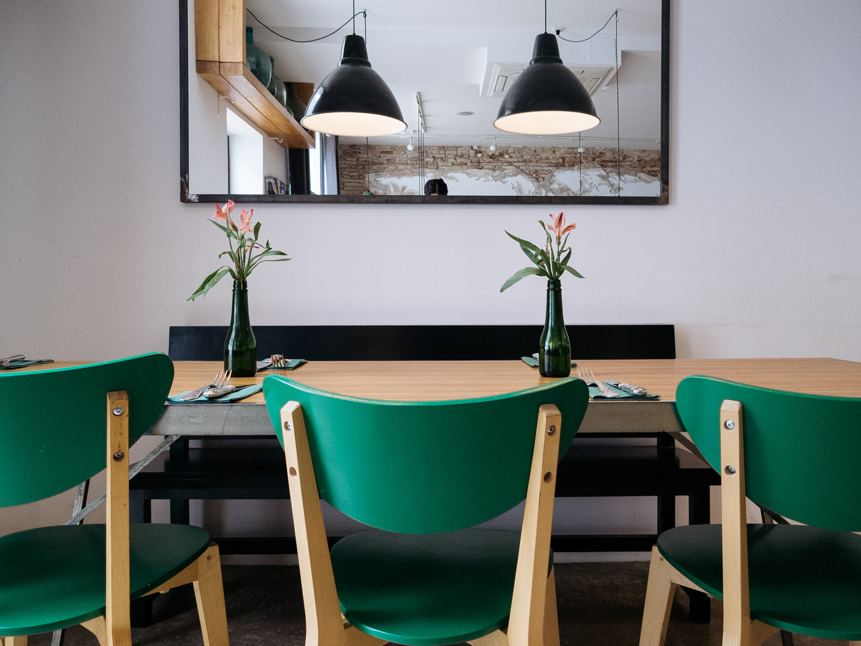 Lovely emerald green mid-century chairs at Trópico restaurant in El Raval, Barcelona