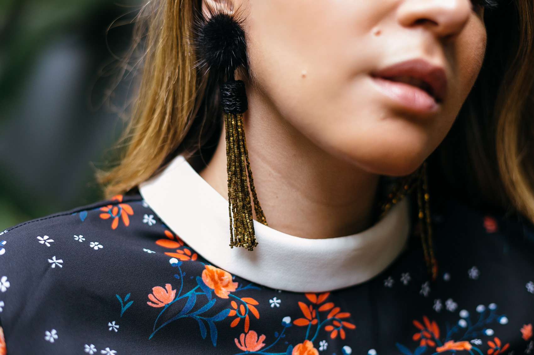 Maristella wearing mignonne gavigan statement tassel fur earrings