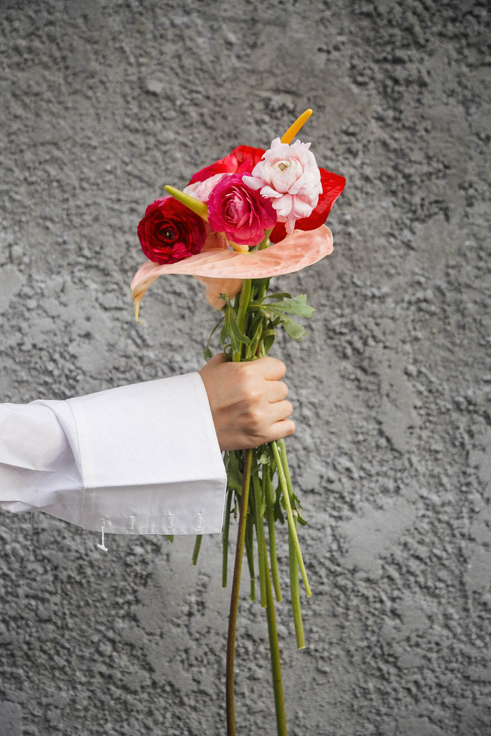 Anthurium and ranunculus bouquet and wide cuff shirt