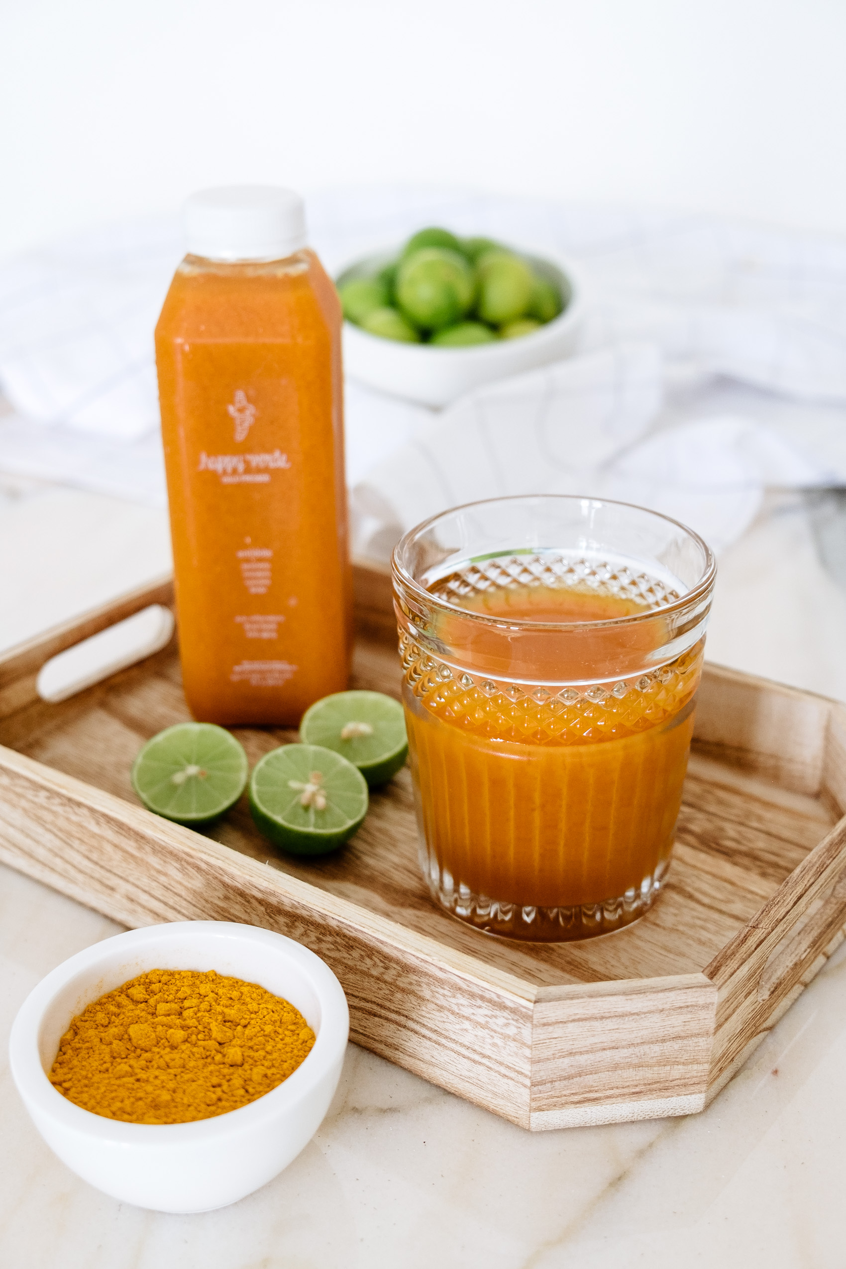 "Antidote" cold-pressed juice by Happy Verde with turmeric, lemon, carrots and apples to address inflammation.