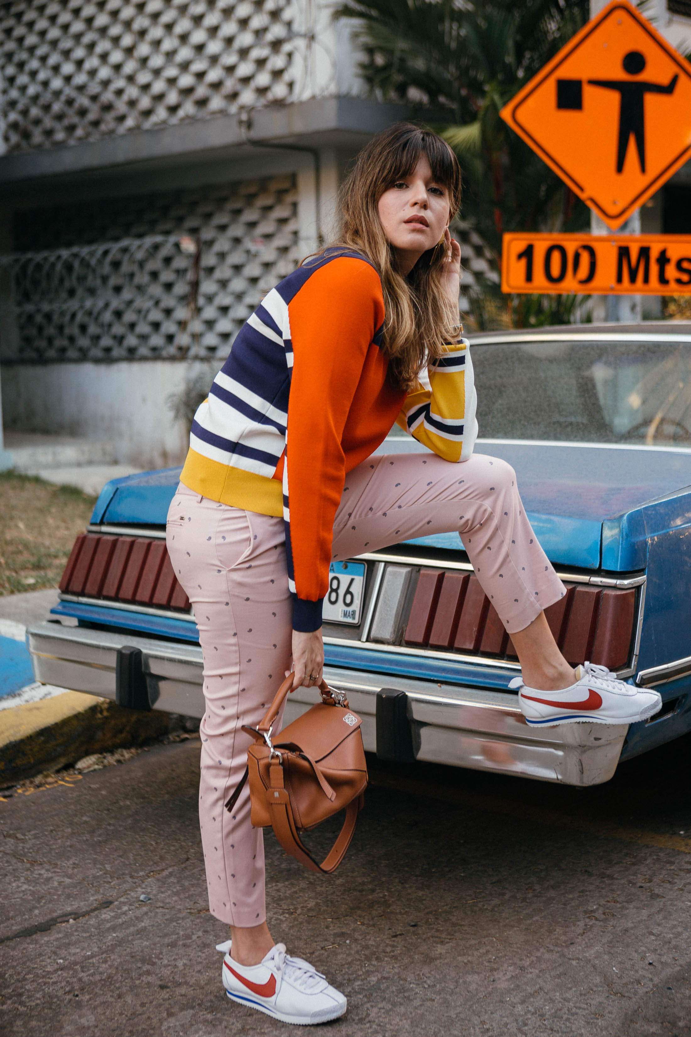Maristella wears a chic sporty colorful look from Tommy Hilfiger Tommyland collection