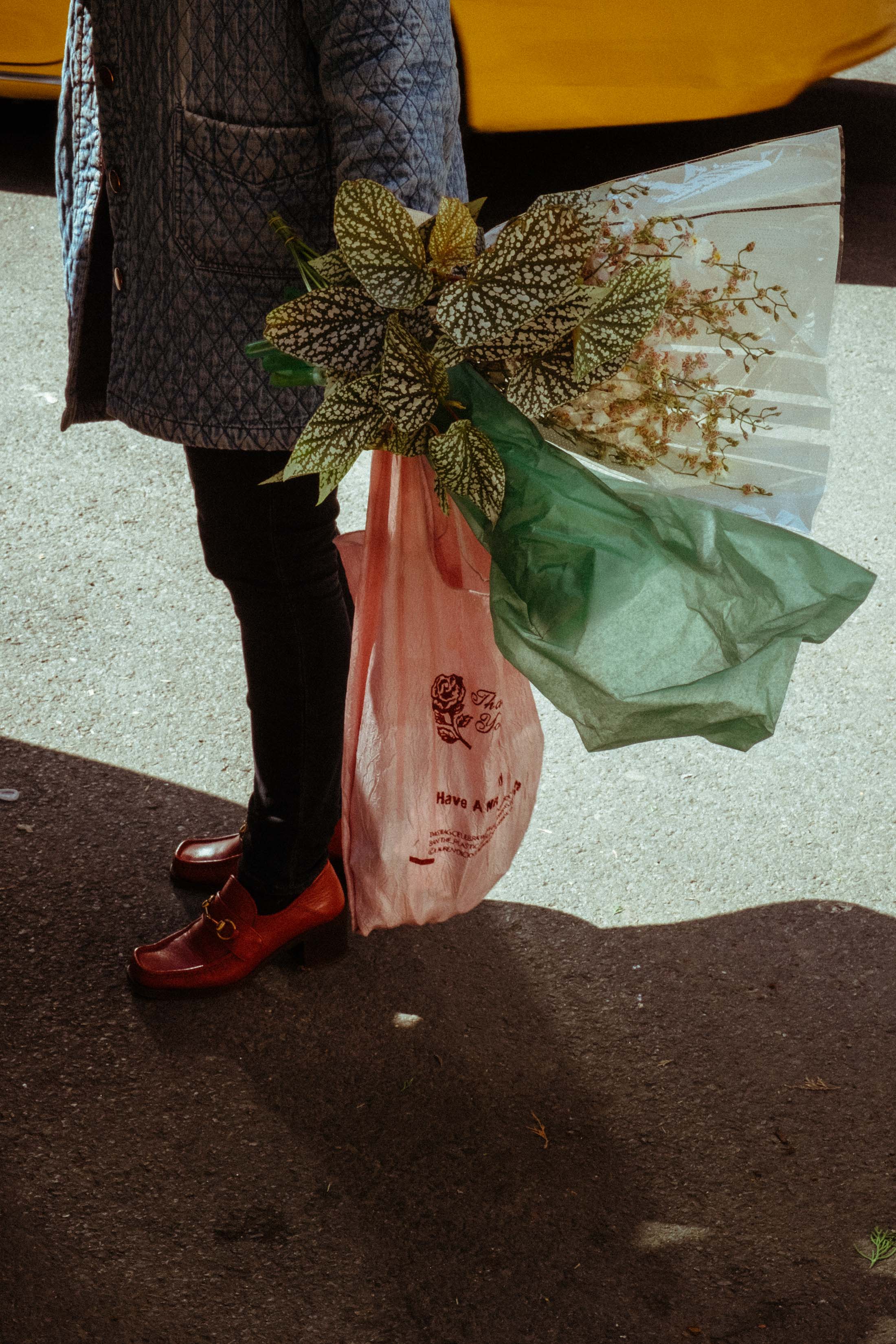 Florist Brittany Asch shops for flowers on 28th street in New York