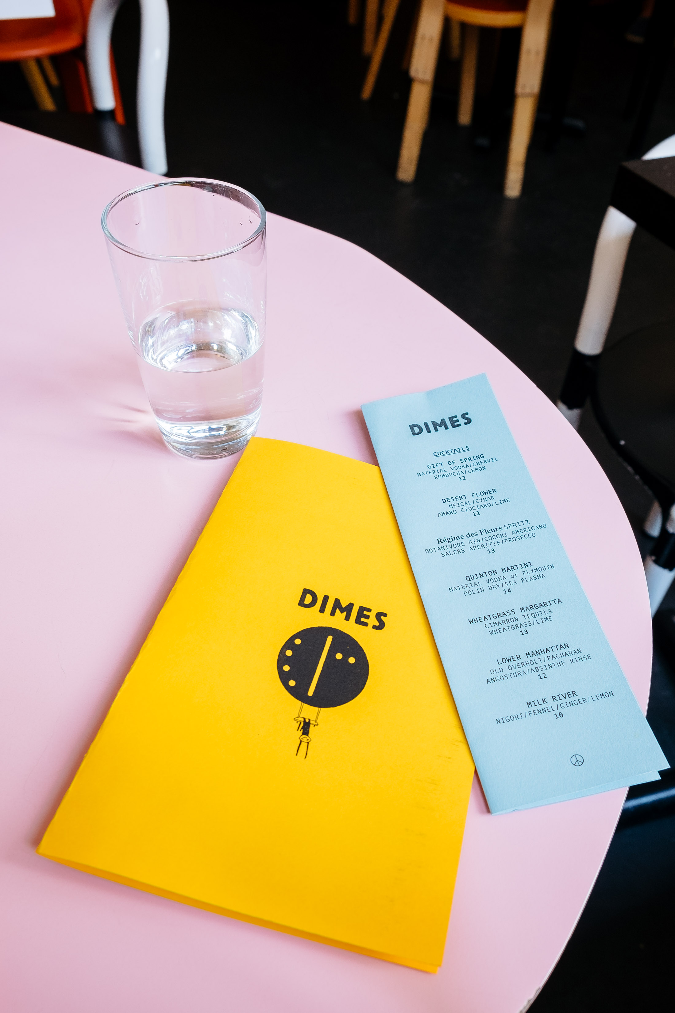 One of the pink tables at Dimes restaurant in Chinatown, New York