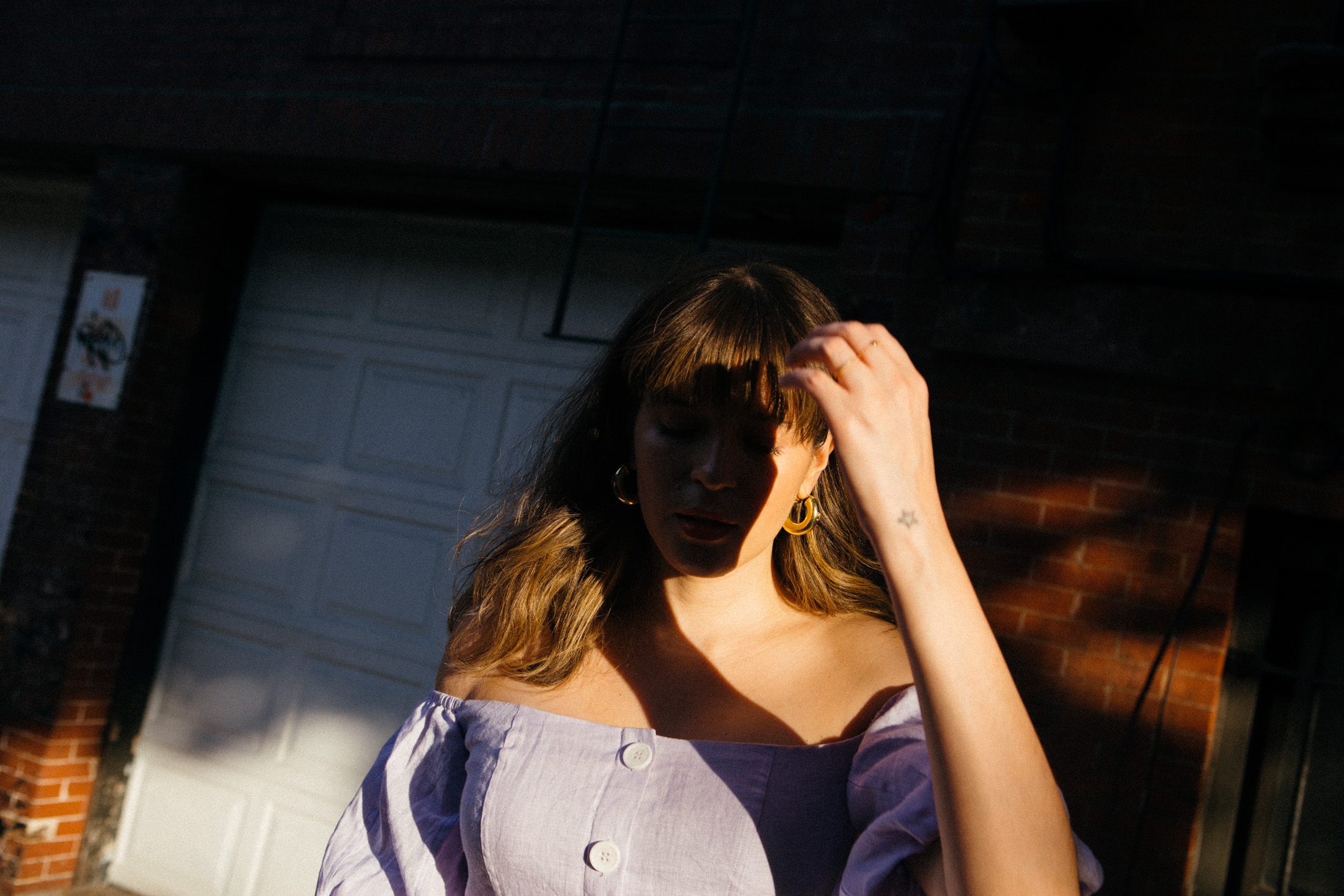 Maristella wearing a bardot linen dress from Kitri Studio